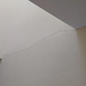 Hairline cracks that keep coming back in the same place.